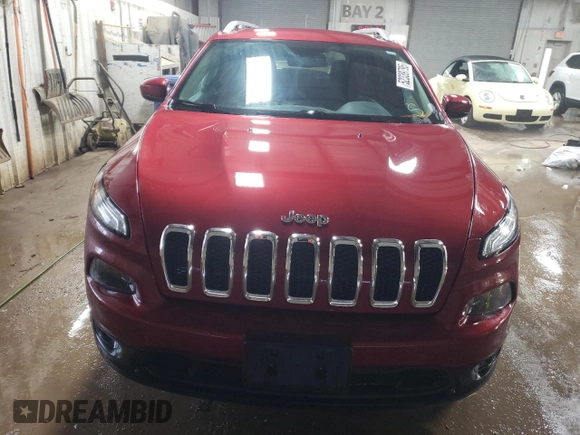2015 Jeep Cherokee Latitude with VIN 1C4PJMCS5FW624799, listed as a Copart auction lot 52339795 with 142,681 mi miles and Salvage Title. Bid and sale history available at DreamBid. Image 5.