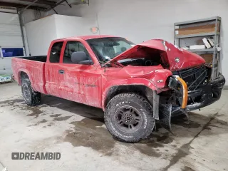 1999 Dodge Dakota SLT with VIN 1B7GG22X8XS314588, listed as a Copart auction lot 87926555 with 204,208 mi miles and Salvage Title. Bid and sale history available at carsss.com. Image 4.