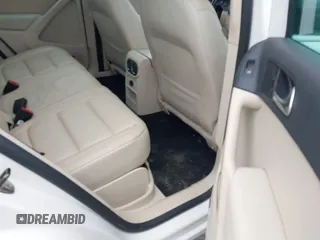 2010 Volkswagen Tiguan with VIN WVGBV9AX2AW513478, listed as a IAAI auction lot 42607466 with 63,780 mi miles and . Bid and sale history available at DreamBid. Image 8.