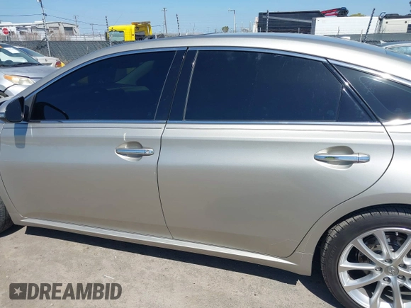 2014 Toyota Avalon Limited with VIN 4T1BK1EB5EU108760, listed as a IAAI auction lot 42148190 with 132,656 mi miles. Bid and sale history available at carsss.com. Image 14.