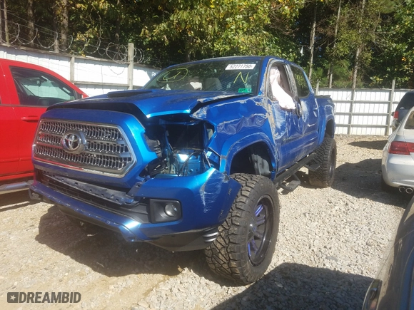 2016 Toyota Tacoma SR with VIN 5TFCZ5ANXGX018193, listed as a Copart auction lot 52271750 with 98,991 mi miles and Salvage Title. Bid and sale history available at carsss.com. Image 2.