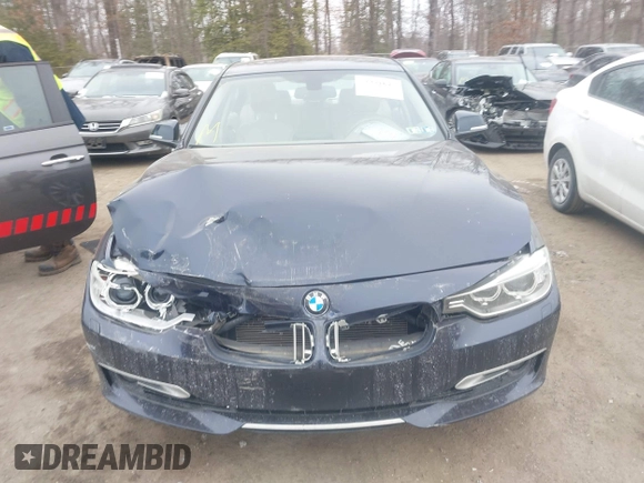 2013 BMW 3 Series 335i xDrive with VIN WBA3B9C50DJ899068, listed as a IAAI auction lot 41331622 with 156,216 mi miles. Bid and sale history available at carsss.com. Image 12.