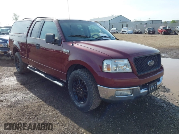 2005 Ford F-150 XLT with VIN 1FTPX12505FB69853, listed as a IAAI auction lot 42092756 with 330,699 mi miles. Bid and sale history available at carsss.com. Image 1.