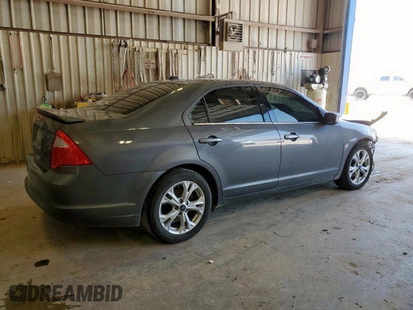 2012 Ford Fusion SE z VIN 3FAHP0HA1CR320160, wystawiony jako Copart lot #57597615 z przebiegiem 142 938 mil mil oraz Szkoda całkowita • Salvage title. Historia ofert i sprzedaży dostępna na DreamBid. Obrazek 3.