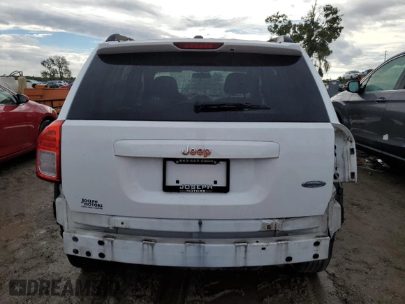 2011 Jeep Compass with VIN 1J4NT1FB8BD138161, listed as a Copart auction lot 73679894 with 199,735 mi miles and Salvage Title. Bid and sale history available at carsss.com. Image 6.