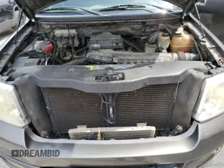 2004 Ford F-150 XLT z VIN 1FTPX14514NB09176, wystawiony jako Copart lot #58732195 z przebiegiem 244 292 mil mil oraz Szkoda całkowita • Salvage title. Historia ofert i sprzedaży dostępna na DreamBid. Obrazek 11.