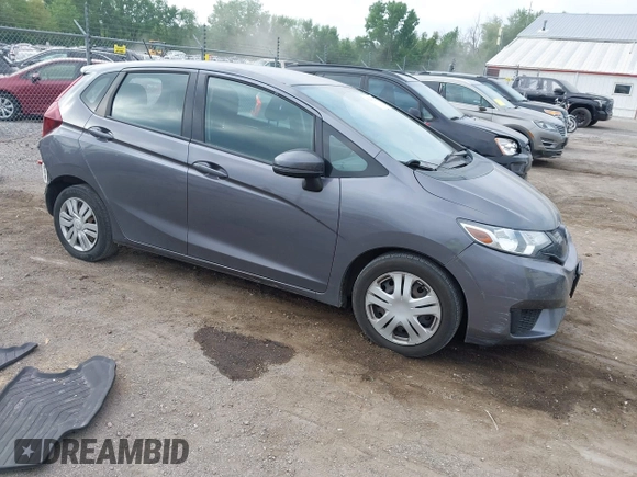 2015 Honda Fit LX with VIN 3HGGK5H58FM722880, listed as a IAAI auction lot 42276261 with 104,886 mi miles and . Bid and sale history available at DreamBid. Image 1.