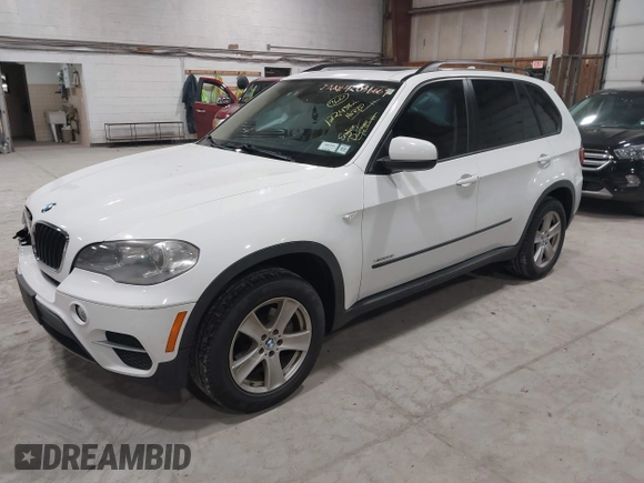 2012 BMW X5 35i z VIN 5UXZV4C54CL748257, wystawiony jako IAAI lot #42036669 z przebiegiem 122 438 mil mil oraz . Historia ofert i sprzedaży dostępna na DreamBid. Obrazek 2.