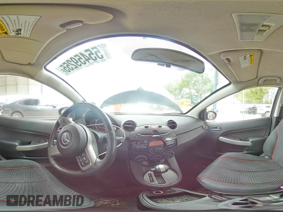 2014 Mazda 2 Touring z VIN JM1DE1LY9E0175946, wystawiony jako Copart lot #55459255 z przebiegiem 109 494 mil mil oraz Szkoda całkowita • Salvage title. Historia ofert i sprzedaży dostępna na DreamBid. Obrazek 16.