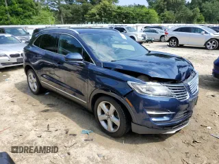 2017 Lincoln MKC Premiere with VIN 5LMCJ1C90HUL15517, listed as a Copart auction lot 59150264 with 71,562 mi miles and Salvage Title. Bid and sale history available at DreamBid. Image 4.