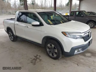2017 Honda Ridgeline RTL-E with VIN 5FPYK3F7XHB030551, listed as a IAAI auction lot 41903844 with 153,594 mi miles. Bid and sale history available at carsss.com. Image 1.