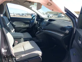 2015 Honda CR-V LX with VIN 3CZRM3H31FG709059, listed as a IAAI auction lot 42131551 with 98,738 mi miles and . Bid and sale history available at carsss.com. Image 5.