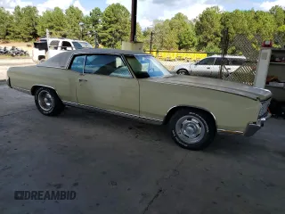 1972 Chevrolet Monte Carlo z VIN 1H57J2L567411, wystawiony jako Copart lot #72465014 z przebiegiem 83 239 mil mil oraz Szkody całkowita. Historia ofert i sprzedaży dostępna na DreamBid. Obrazek 4.