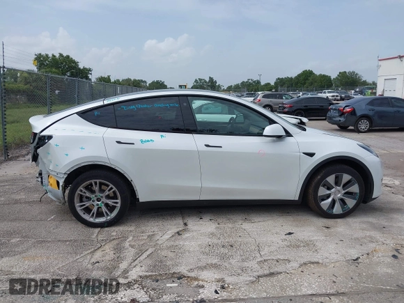 2023 Tesla Model Y Long Range z VIN 7SAYGDEE0PA065534, wystawiony jako IAAI lot #42445868 z przebiegiem 22 638 mil mil oraz . Historia ofert i sprzedaży dostępna na DreamBid. Obrazek 13.