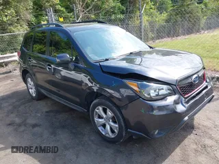 2014 Subaru Forester Touring z VIN JF2SJAMC4EH411623, wystawiony jako IAAI lot #42159323 z przebiegiem 143 304 mil mil oraz . Historia ofert i sprzedaży dostępna na DreamBid. Obrazek 1.