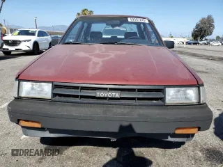 1986 Toyota Corolla with VIN JT2AE82EXG3386120, listed as a Copart auction lot 59397245 with 276,586 mi miles and Salvage title. Bid and sale history available at DreamBid. Image 5.