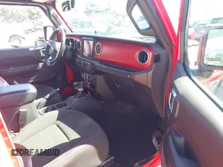 2022 Jeep Wrangler Unlimited Rubicon с VIN 1C4HJXFN5NW129979, выставлен на аукционе IAAI как лот 41725512 с пробегом 36 578 миль миль и . История ставок и продаж доступна на DreamBid. Изображение 5.