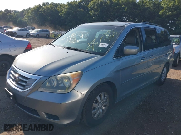 2008 Honda Odyssey EX-L with VIN 5FNRL38718B053448, listed as a IAAI auction lot 40182359 with 164,902 mi miles and . Bid and sale history available at DreamBid. Image 2.