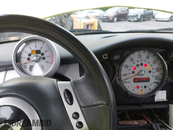 2002 MINI Hardtop with VIN WMWRC33472TC33275, listed as a IAAI auction lot 42537323 with 173,611 mi miles and . Bid and sale history available at DreamBid. Image 7.