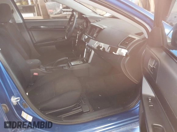 2017 Mitsubishi Lancer ES with VIN JA32V2FW4HU006890, listed as a IAAI auction lot 41636035 with 165,077 mi miles. Bid and sale history available at carsss.com. Image 5.