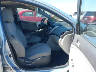 2014 Hyundai Accent GS with VIN KMHCT5AE1EU187112, listed as a IAAI auction lot 41894869 with 100,640 mi miles. Bid and sale history available at carsss.com. Image 5.
