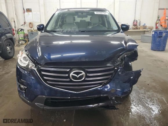 2016 Mazda CX-5 Grand Touring with VIN JM3KE4DY3G0729225, listed as a Copart auction lot 68288754 with 77,752 mi miles and Salvage Title. Bid and sale history available at carsss.com. Image 5.