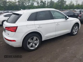 2018 Audi Q5 Premium Plus z VIN WA1BNAFY6J2214696, wystawiony jako IAAI lot #42350132 z przebiegiem 54 550 mil mil oraz . Historia ofert i sprzedaży dostępna na DreamBid. Obrazek 4.