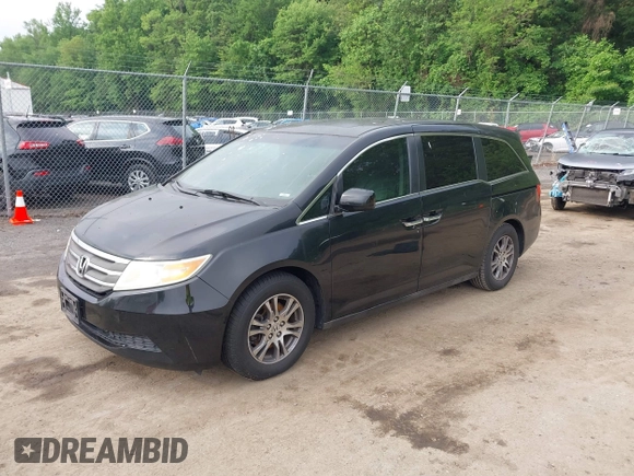 2011 Honda Odyssey EX-L with VIN 5FNRL5H68BB071178, listed as a IAAI auction lot 42286324 with 213,847 mi miles and . Bid and sale history available at DreamBid. Image 2.