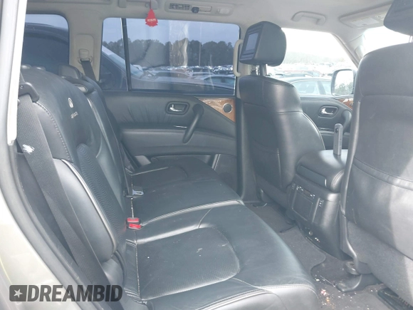 2012 Infiniti QX56 8-passenger with VIN JN8AZ2ND7C9716559, listed as a IAAI auction lot 41465078 with 184,373 mi miles and . Bid and sale history available at DreamBid. Image 8.
