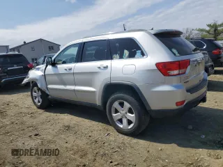 2012 Jeep Grand Cherokee Laredo with VIN 1C4RJFAG4CC123354, listed as a Copart auction lot 52711295 with 151,004 mi miles and Salvage Title. Bid and sale history available at carsss.com. Image 2.