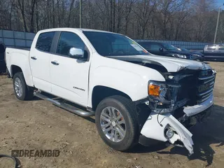 2015 GMC Canyon 4WD SLT with VIN 1GTG6CE30F1269698, listed as a IAAI auction lot 41508606 with 83,566 mi miles. Bid and sale history available at carsss.com. Image 1.