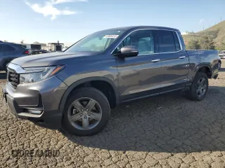 2022 Honda Ridgeline RTL-E with VIN 5FPYK3F71NB027341, listed as a Copart auction lot 49859415 with 38,477 mi miles and Salvage Title. Bid and sale history available at DreamBid. Image 1.