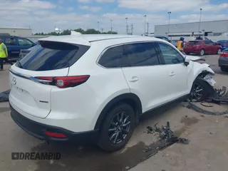 2022 Mazda CX-9 Touring with VIN JM3TCBCY0N0608052, listed as a IAAI auction lot 42027465 with 65,313 mi miles and . Bid and sale history available at DreamBid. Image 4.