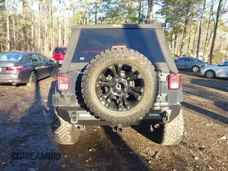 2018 Jeep Wrangler JK Unlimited Altitude with VIN 1C4BJWEG1JL842456, listed as a IAAI auction lot 41123988 with 55,310 mi miles. Bid and sale history available at carsss.com. Image 16.