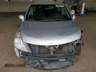 2010 Nissan Versa 1.8 SL with VIN 3N1BC1CP7AL405424, listed as a Copart auction lot 66941474 with 143,410 mi miles and Salvage Title. Bid and sale history available at carsss.com. Image 5.