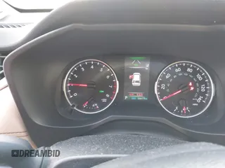 2021 Toyota RAV4 XLE Premium z VIN 2T3A1RFV2MW217009, wystawiony jako IAAI lot #41526066 z przebiegiem 36 619 mil mil oraz . Historia ofert i sprzedaży dostępna na DreamBid. Obrazek 7.