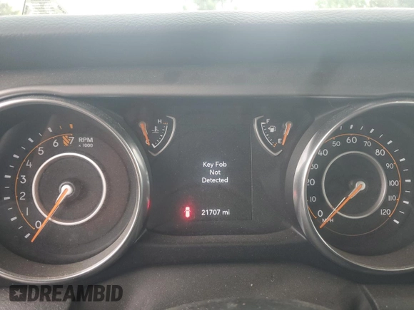 2022 Jeep Wrangler Sport with VIN 1C4HJXAG7NW147909, listed as a Copart auction lot 73051454 with 21,707 mi miles and Salvage Title. Bid and sale history available at DreamBid. Image 9.