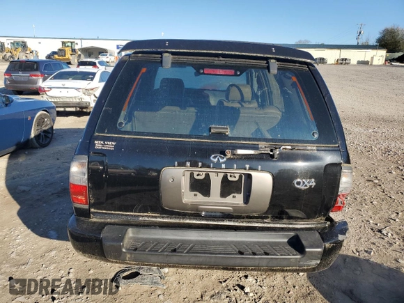 1998 Infiniti QX4 with VIN JNRAR05YXWW025938, listed as a Copart auction lot 49781395 with 111,967 mi miles and Salvage Title. Bid and sale history available at DreamBid. Image 6.