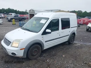 2013 Ford Transit Connect XLT with VIN NM0KS9BN7DT125935, listed as a IAAI auction lot 42351848 with 186,650 mi miles and . Bid and sale history available at DreamBid. Image 2.