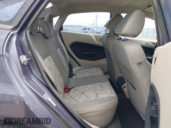 2013 Ford Fiesta SE z VIN 3FADP4BJ3DM186569, wystawiony jako IAAI lot #42128913 z przebiegiem 19 228 mil mil oraz . Historia ofert i sprzedaży dostępna na DreamBid. Obrazek 8.