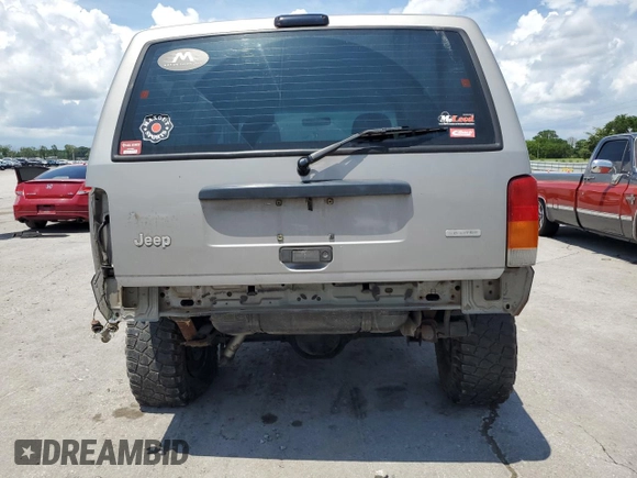 2000 Jeep Cherokee SE with VIN 1J4FF28SXYL140930, listed as a Copart auction lot 59191035 with 248,598 mi miles and Salvage title. Bid and sale history available at DreamBid. Image 6.