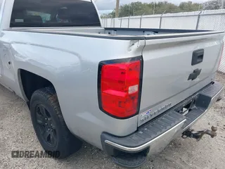 2018 Chevrolet Silverado 1500 LT with VIN 1GCRCREC5JZ138622, listed as a IAAI auction lot 41631828 with Not Provided miles and . Bid and sale history available at DreamBid. Image 6.