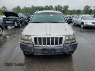 2004 Jeep Grand Cherokee Laredo z VIN 1J4GW48S74C288625, wystawiony jako Copart lot #61290805 z przebiegiem 194 615 mil mil oraz Czysty tytuł • Clean title. Historia ofert i sprzedaży dostępna na DreamBid. Obrazek 5.