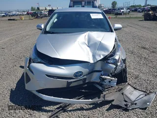 2017 Toyota Prius Two with VIN JTDKBRFU7H3574039, listed as a IAAI auction lot 42410071 with 101,080 mi miles and . Bid and sale history available at DreamBid. Image 12.