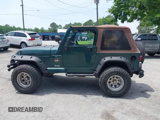 2000 Jeep Wrangler Sahara with VIN 1J4FA59S8YP722208, listed as a IAAI auction lot 42294978 with 238,024 mi miles and . Bid and sale history available at DreamBid. Image 14.