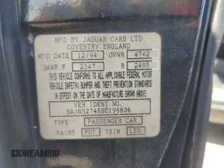 1995 Jaguar XJS with VIN SAJNX2748SC198836, listed as a Copart auction lot 75833334 with 145,794 mi miles and Salvage Title. Bid and sale history available at carsss.com. Image 13.