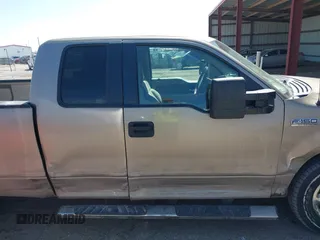 2005 Ford F-150 XLT with VIN 1FTPX14525NA78019, listed as a IAAI auction lot 41932381 with 170,153 mi miles. Bid and sale history available at carsss.com. Image 13.