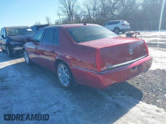 2006 Cadillac DTS w/1SC with VIN 1G6KD57Y06U210141, listed as a IAAI auction lot 41406256 with 184,569 mi miles. Bid and sale history available at carsss.com. Image 3.