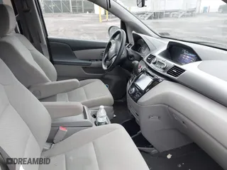 2016 Honda Odyssey SE with VIN 5FNRL5H3XGB150025, listed as a IAAI auction lot 41857704 with 69,515 mi miles. Bid and sale history available at carsss.com. Image 5.