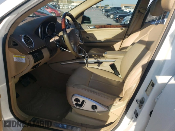 2010 Mercedes-Benz GL-Class GL 450 with VIN 4JGBF7BE8AA595373, listed as a Copart auction lot 73852304 with 211,033 mi miles and Salvage Title. Bid and sale history available at carsss.com. Image 7.